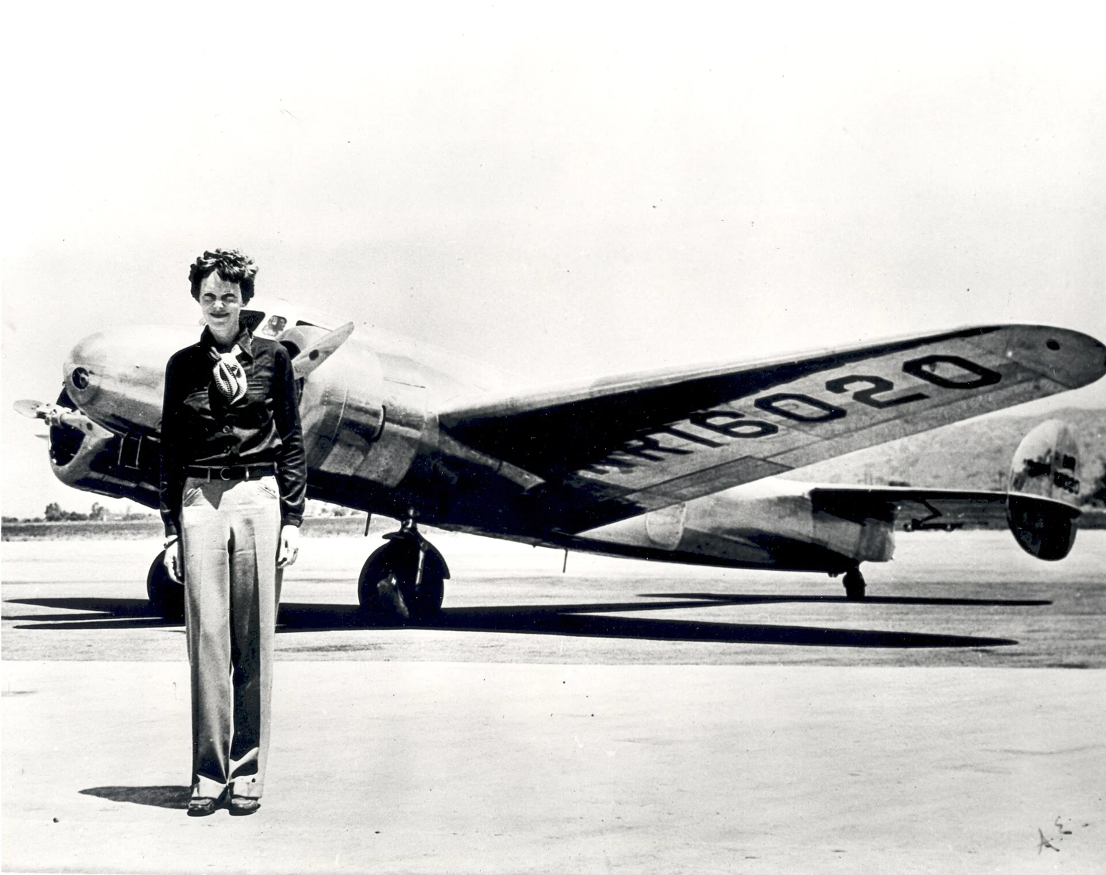 Amelia Earhart beside a Lockheed Electra · archive photo, 1937
