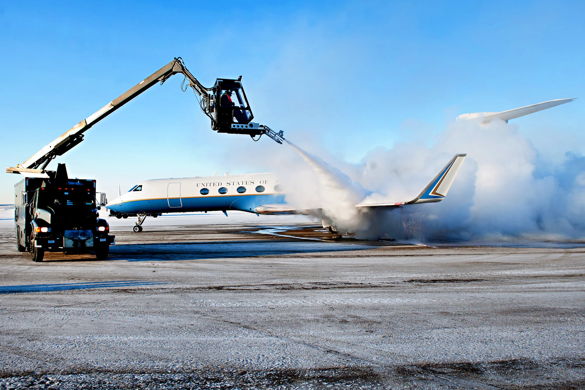 Anti-icing treatment on a C-37B prior to departure.